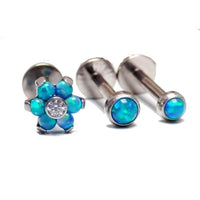 Titanium Peacock Blue Opal Triple Helix Set featuring titanium jewelry with peacock blue opal accents and a triple helix design.