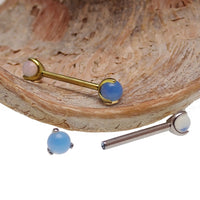 Titanium internally threaded nipple jewelry with opalite moonstone, 14g, 10mm, featuring a smooth, polished design.
