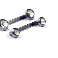 Titanium 14g 5/8 inch Swarovski crystal disc surface barbell with sparkling crystal details on a surface piercing bar.